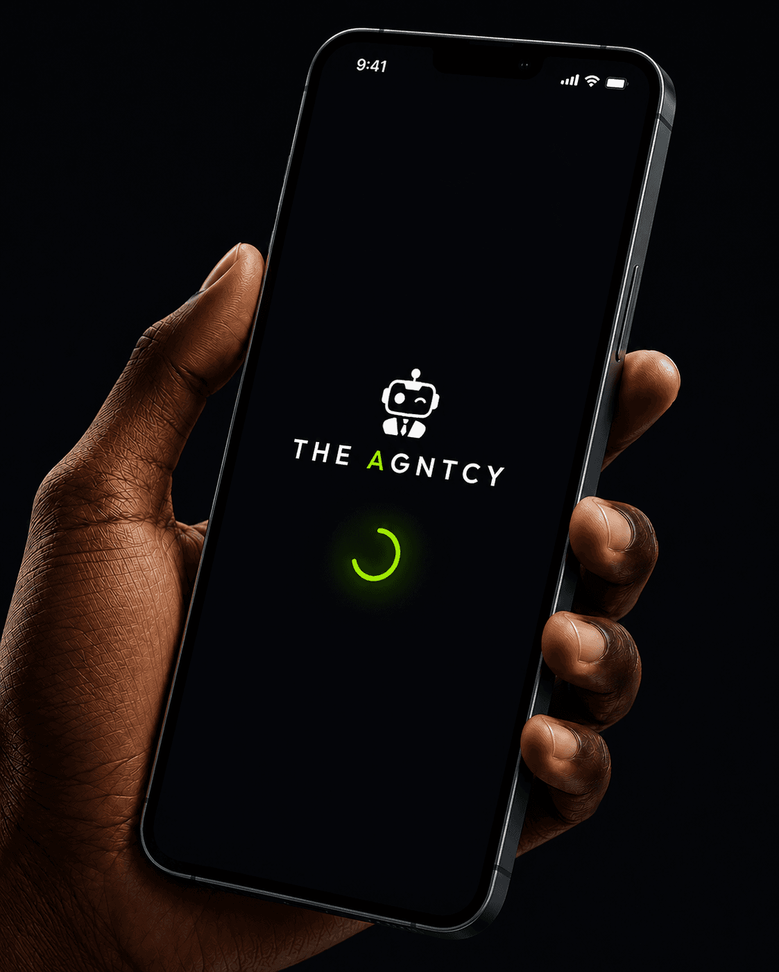 Hand holding a phone showing The AGNTCY app